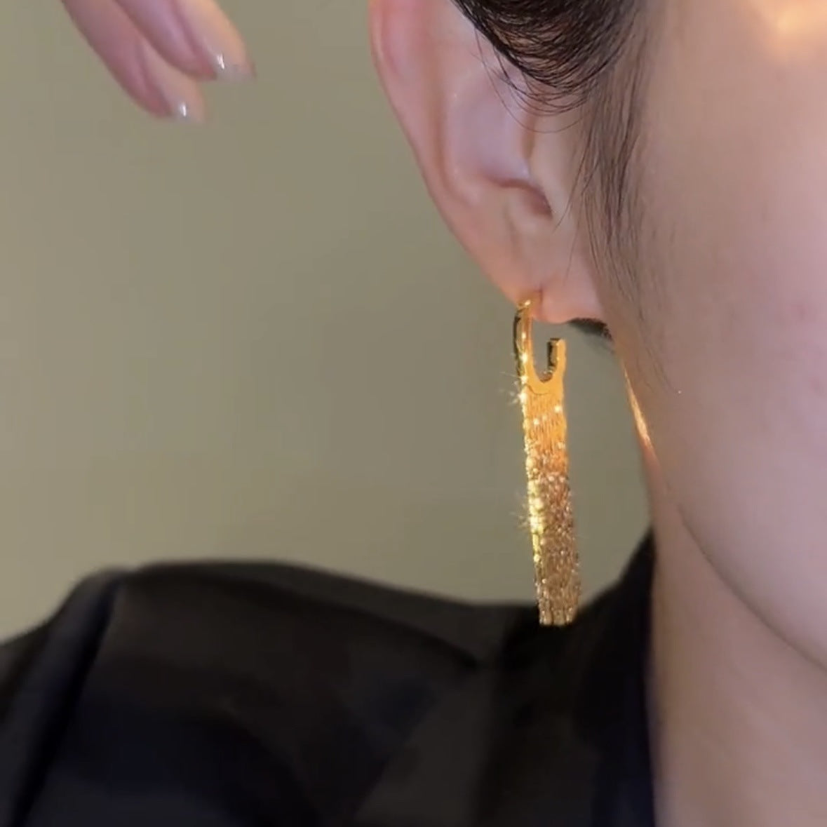 Elegante lange kwastoorbellen