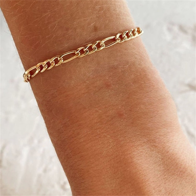 Saturnus gouden schakelarmband