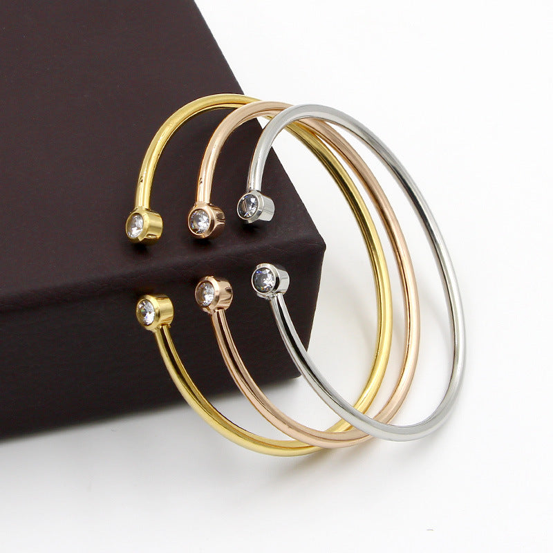 Gouden Armband met Open Uiteinde en Tweelingkristallen