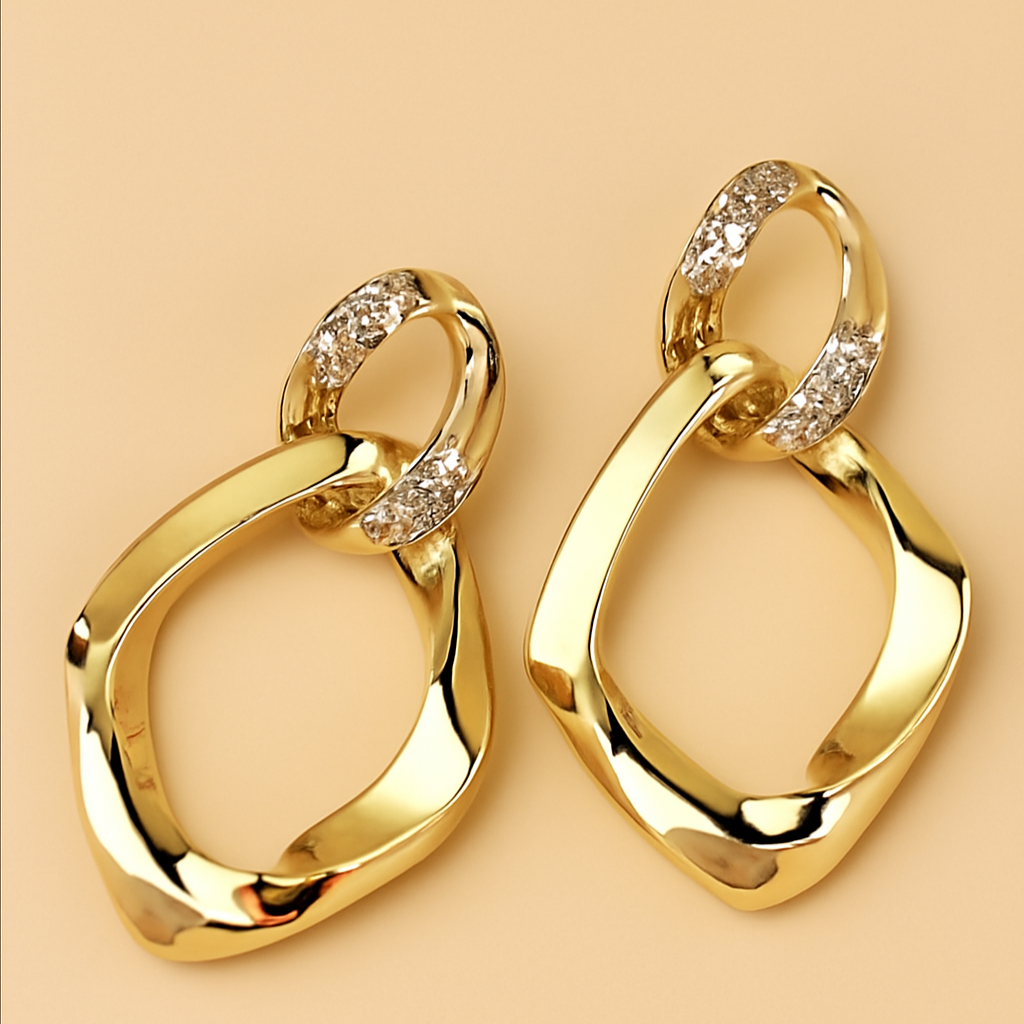 Vergulde geometrische oorbellen met glasinleg