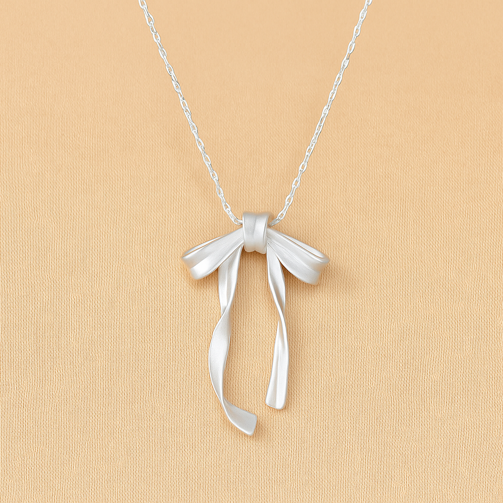 Elegante Ketting met Strikvormige Hanger en Synthetische Steen