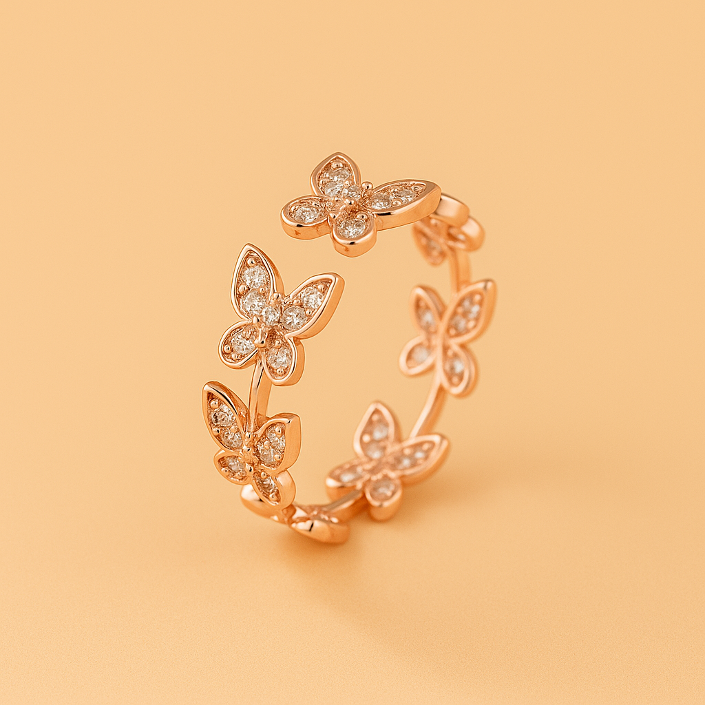 Elegante koperen vlinderring met glanzende zirkonia