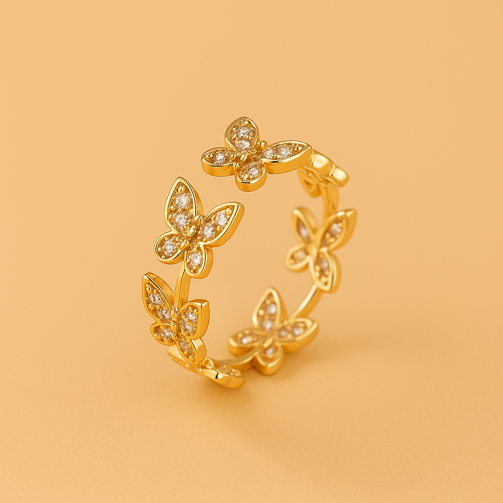 Elegante koperen vlinderring met glanzende zirkonia