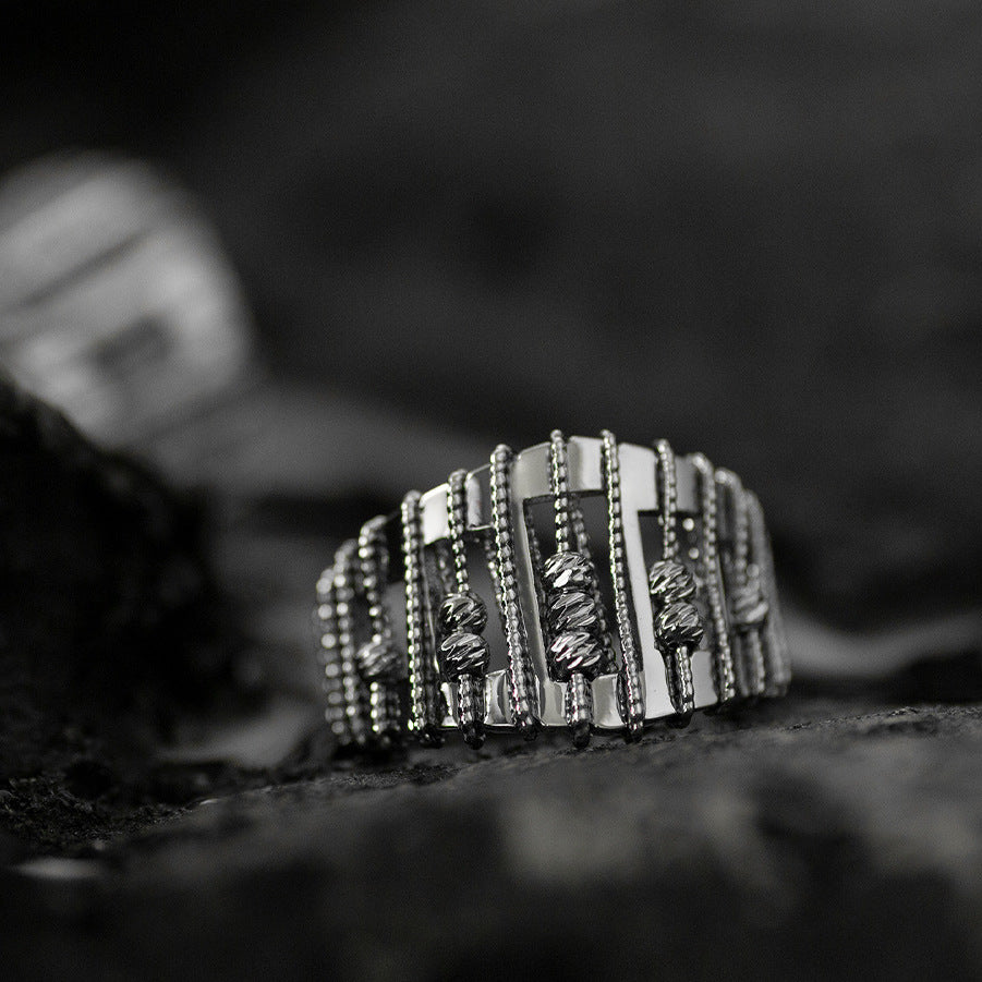 Opengewerkte, parelversierde, verstelbare ring