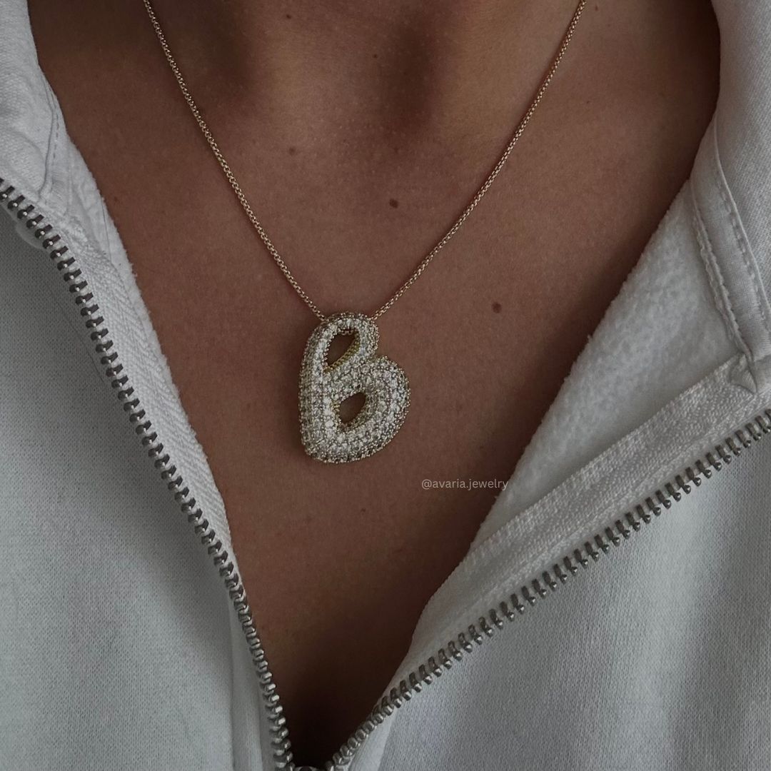 Bubbel initiaal diamanten ketting