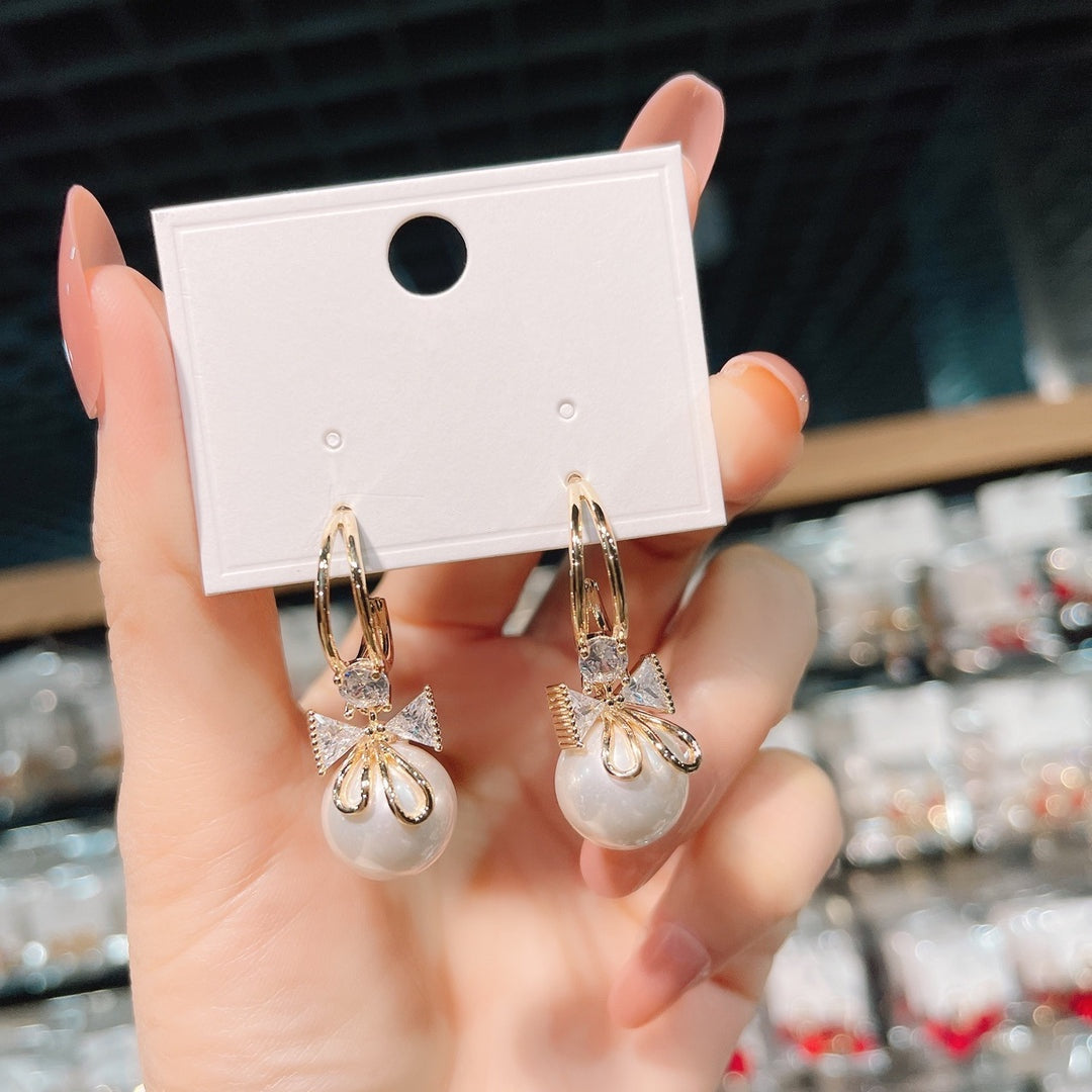 Dubbele Strik Parel Oorbellen