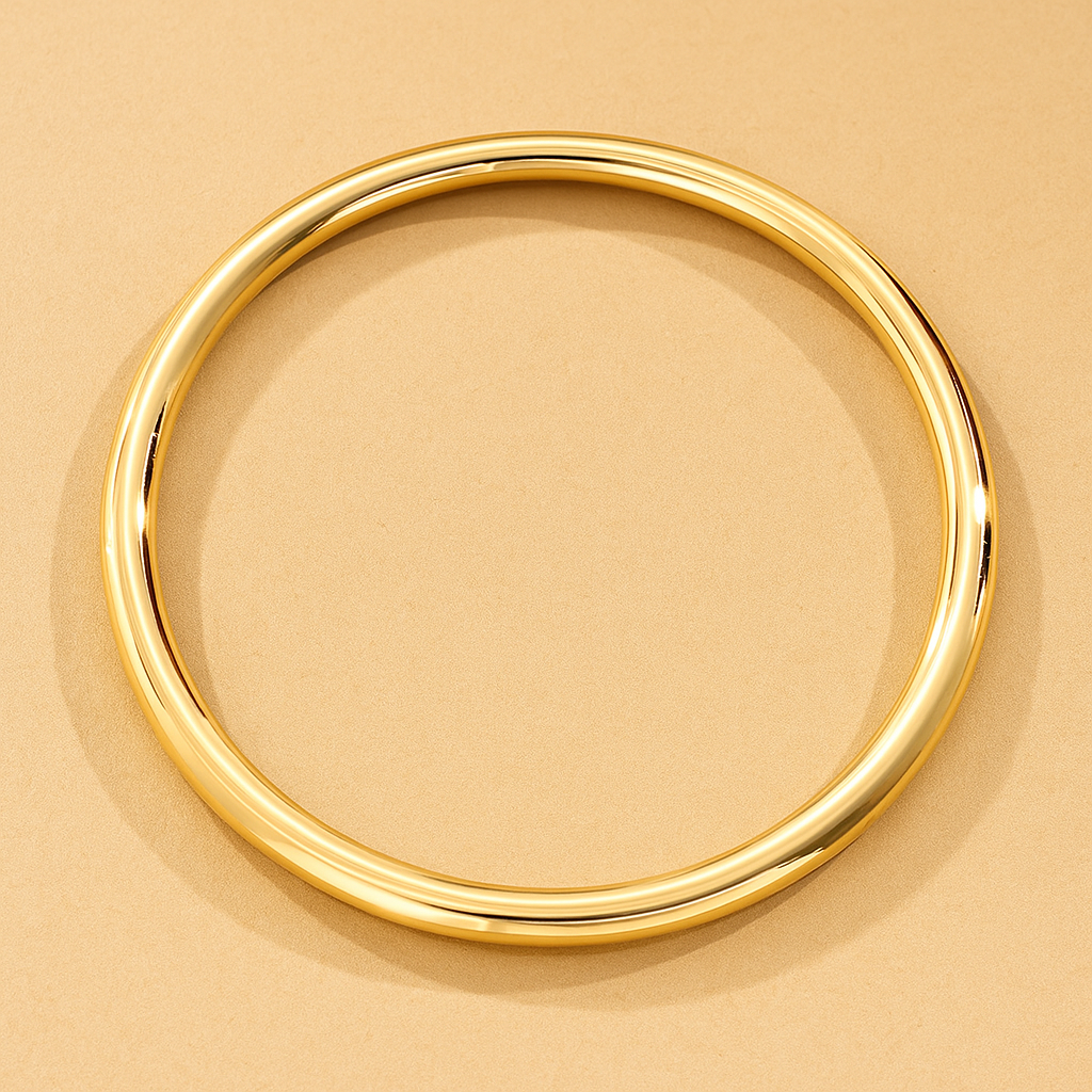 Elegante armband in goudkleurige dunne buisvorm