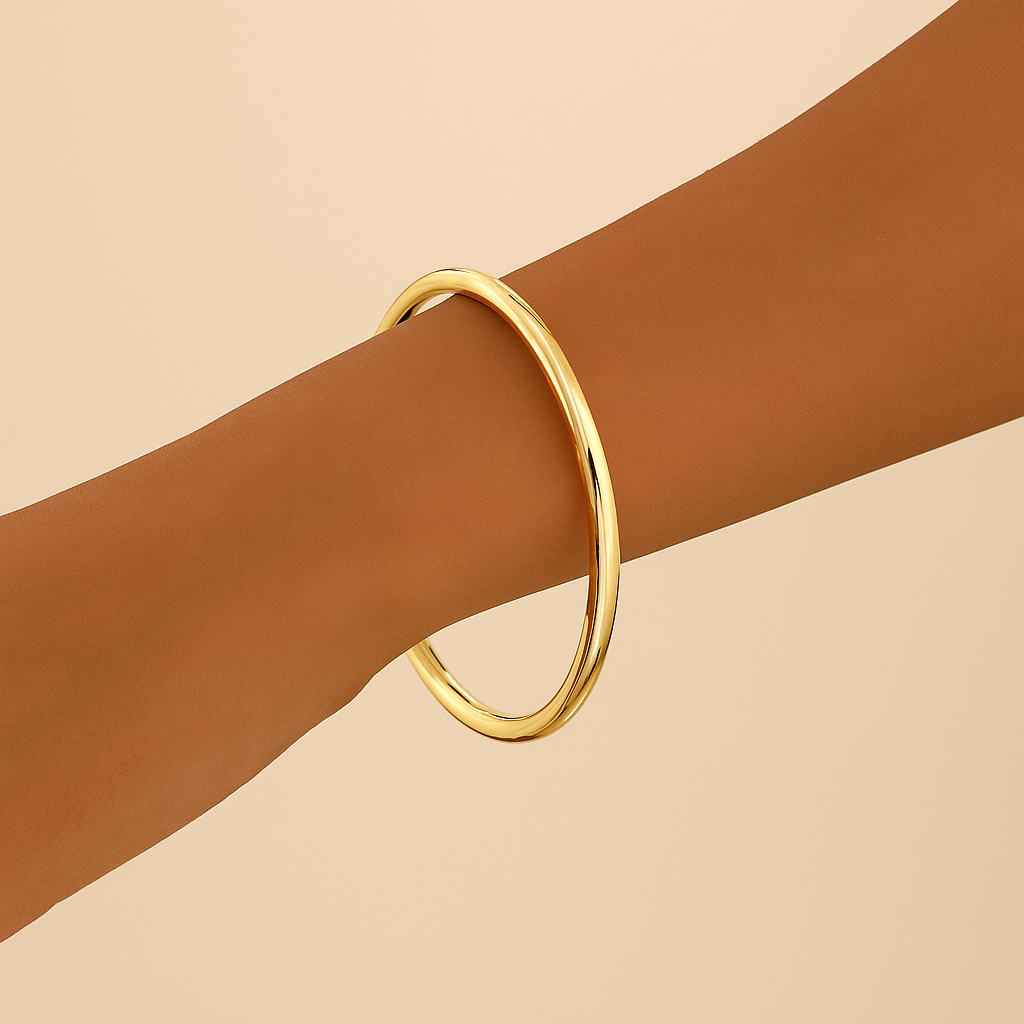 Elegante armband in goudkleurige dunne buisvorm