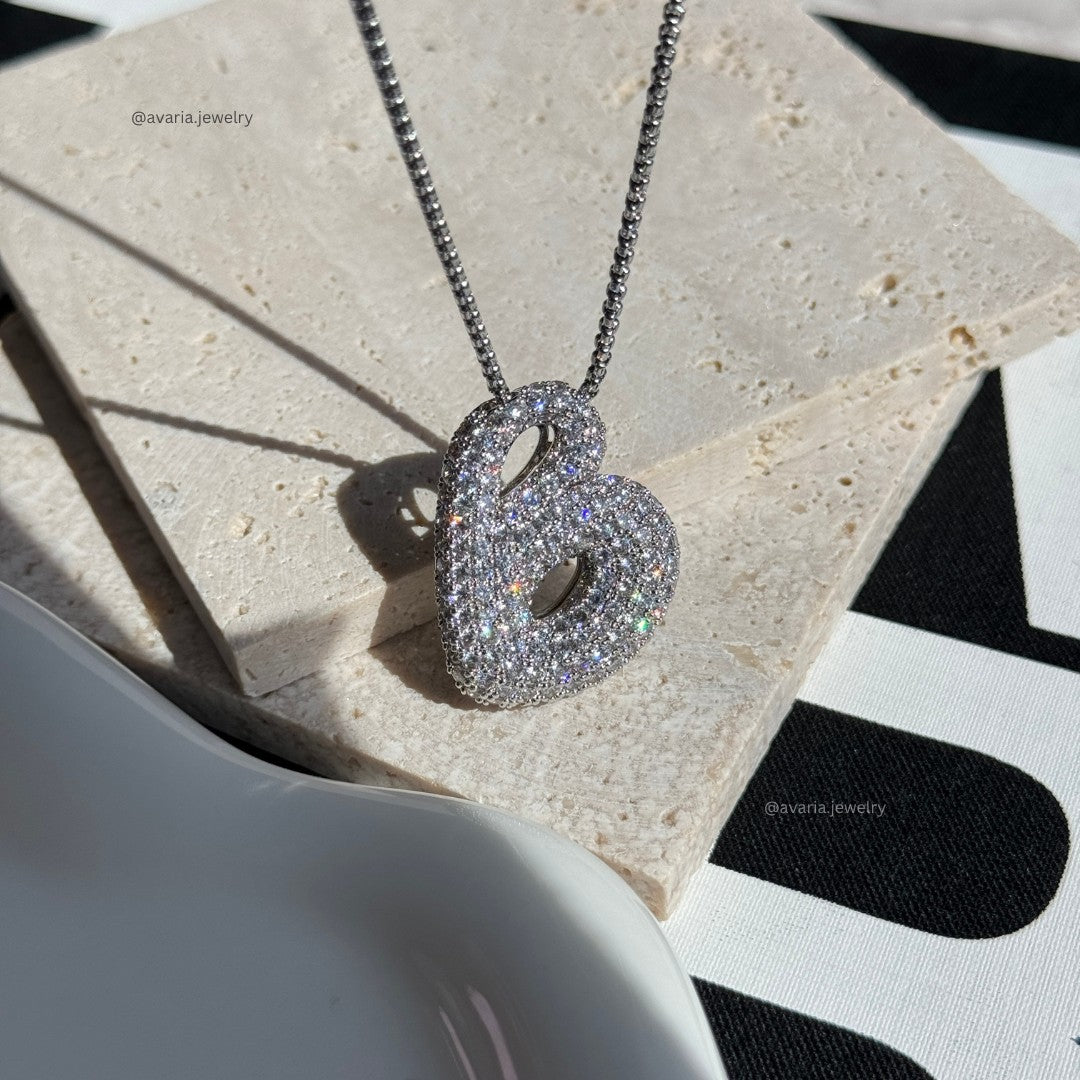 Bubbel initiaal diamanten ketting