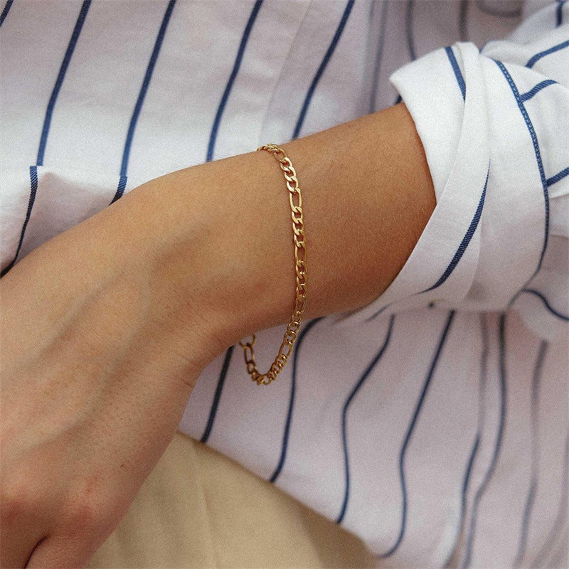Saturnus gouden schakelarmband