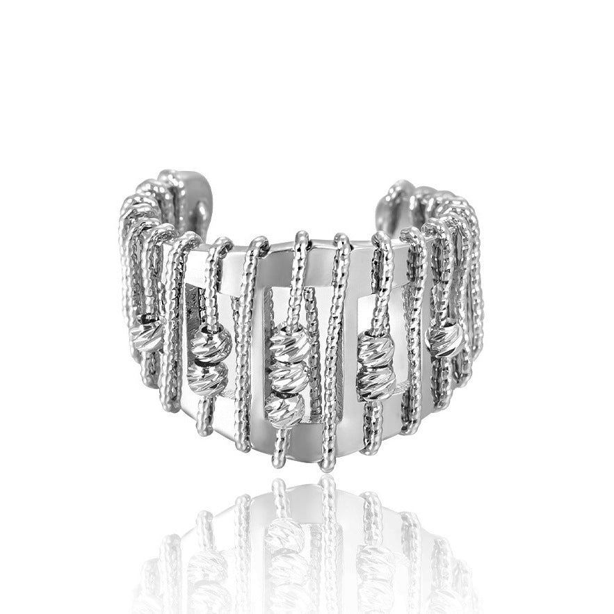 Opengewerkte, parelversierde, verstelbare ring