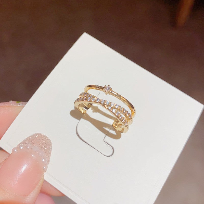 Kruis lagen delicate zirkonia ring