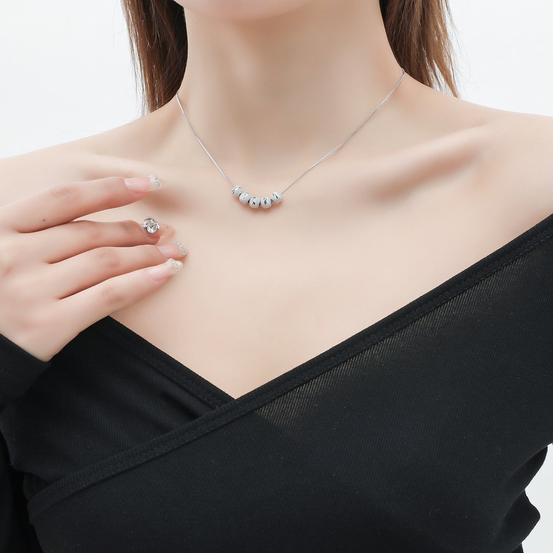 Ketting met kralen van kalmte