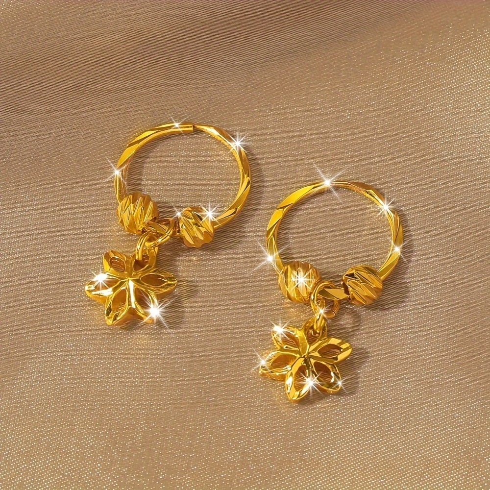 Paar Vergulde Holle Steroorbellen met Bloemenmotief & Kralen